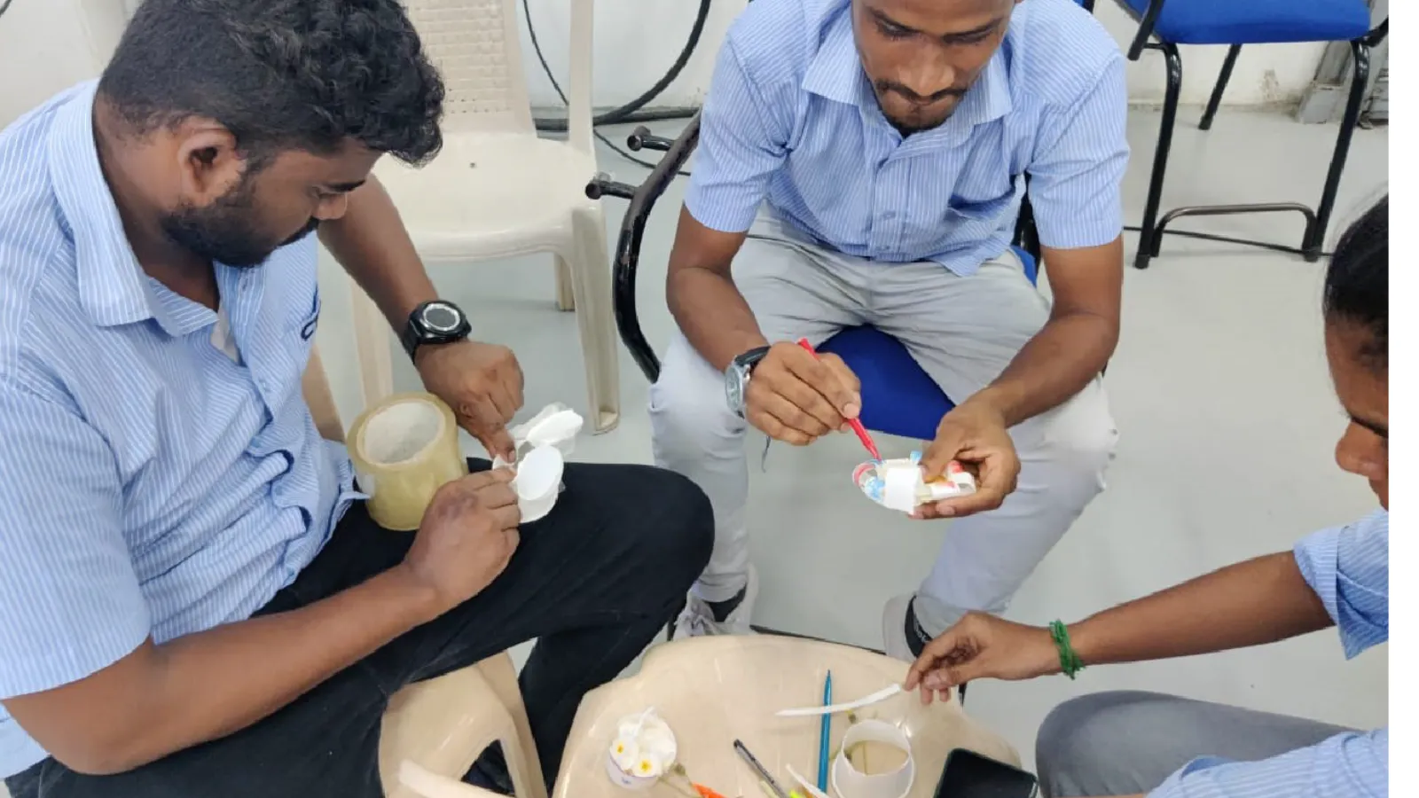 Participants working on a Green Belt practical exercise