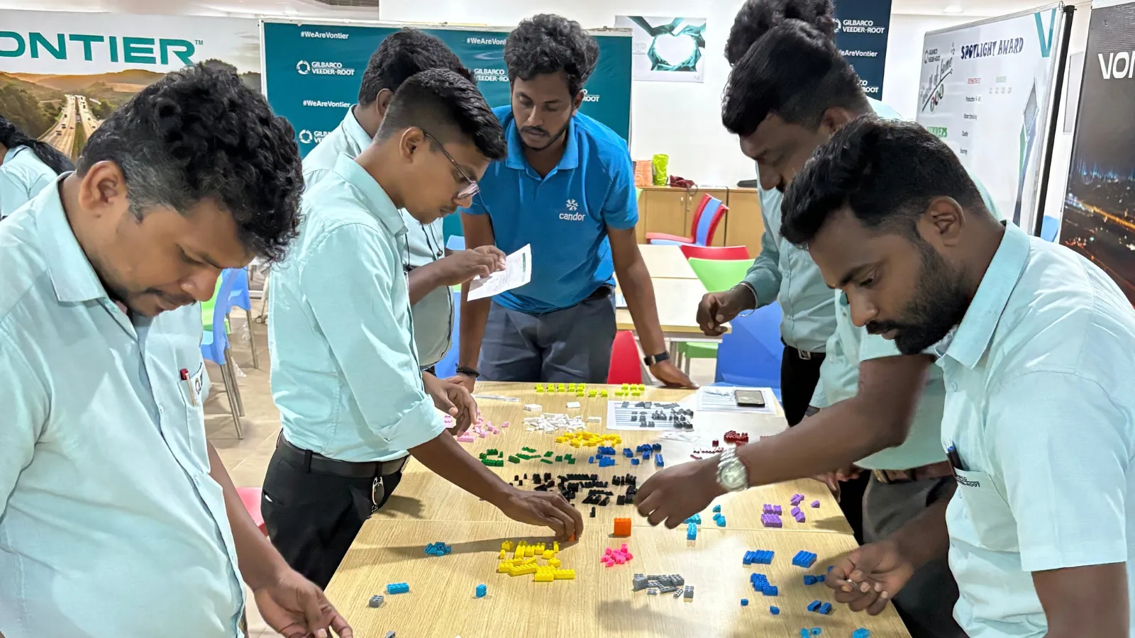 Participants during a hands-on Lean Six Sigma training activity