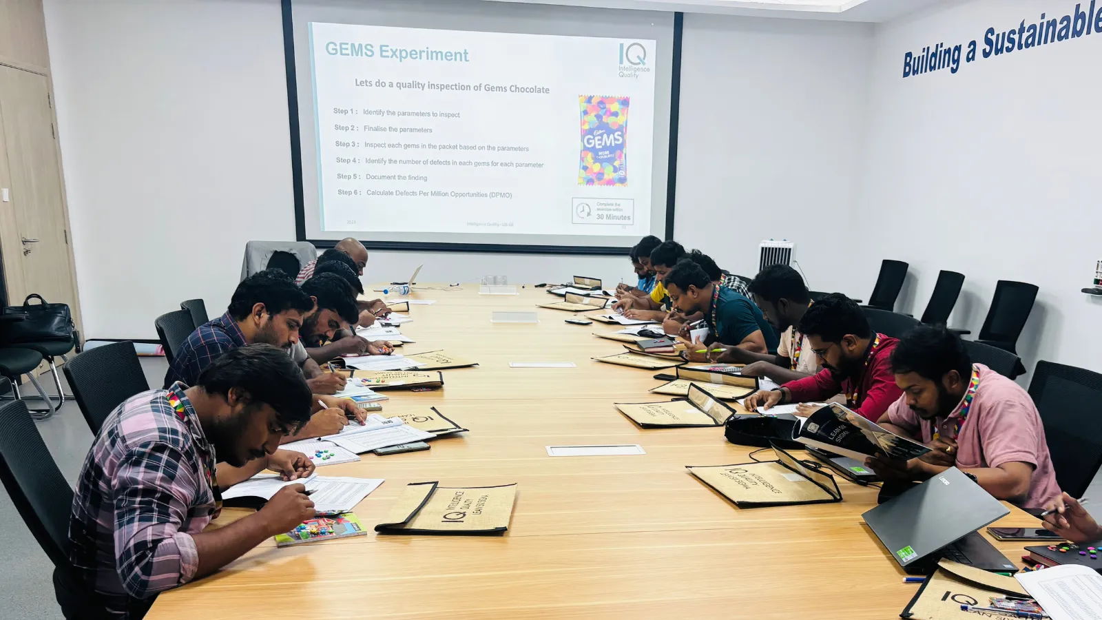 Participants during a practical Lean Six Sigma training session